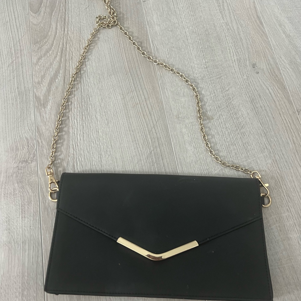 Black and gold Aldo clutch